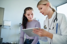Young woman seeing doctor
